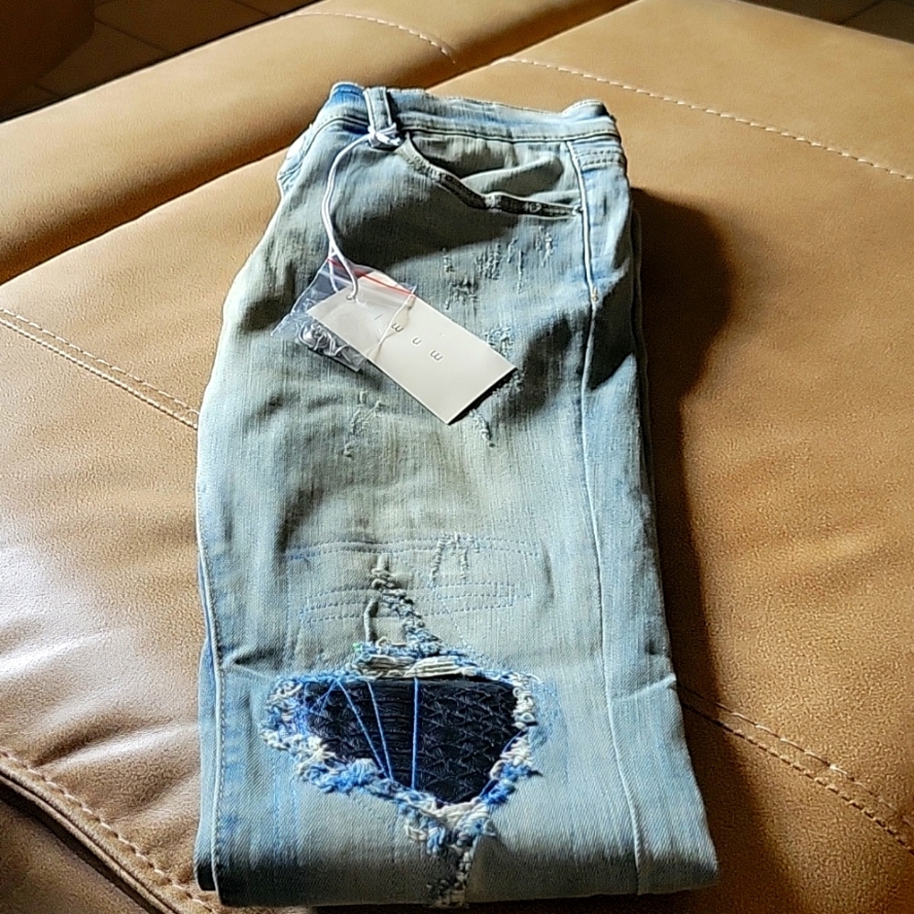 I'm selling these brand new MNMI jeans with tags.